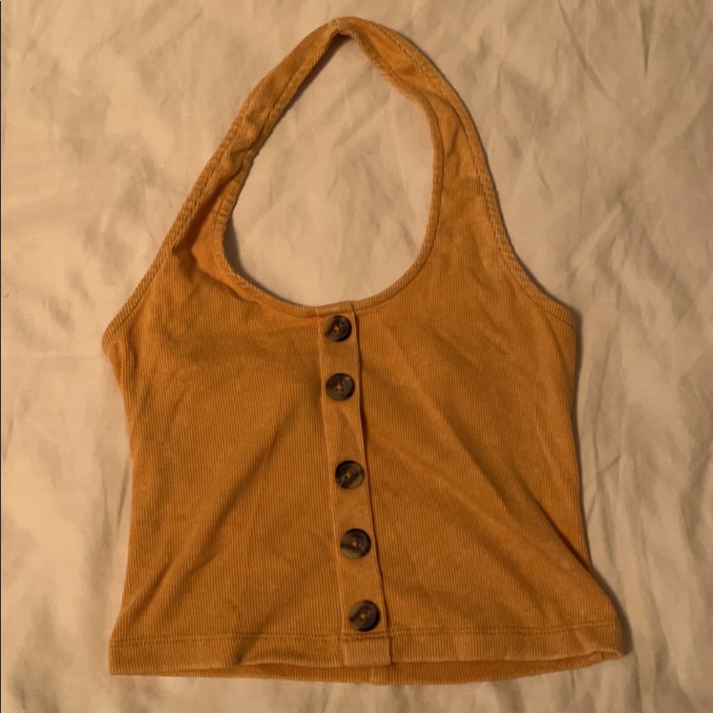 Cropped distressed tan/orange halter top. Lightly worn. Form fitting.